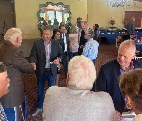 The crowd of attendees gather